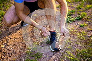 Man tying running shoes. Healthy lifestyle