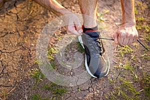 Man tying running shoes. Healthy lifestyle