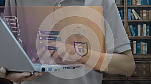 Man typing on keyboard with login name and password on screen display. Concept of cyber security, data protection and secure