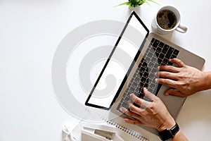 Businessman hands working on laptop, Top view shot and copy space