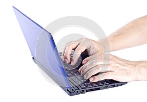 Man Typing on a Mini Netbook