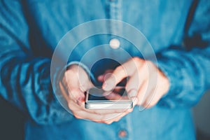 Man Typing Phone Message On Social Network