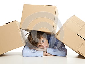 Man under boxes
