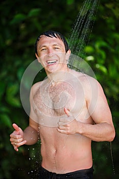 Man under a cold shower