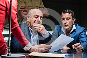 Man under the pressure of a difficult interrogation at the police