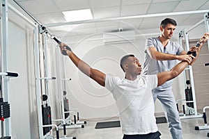 Man undergoing physiotherapy session with professional physiotherapist