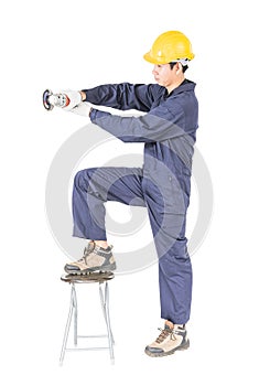 Man in uniform hold grinder, Cutout isolated on white