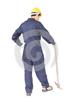 Man in uniform hold old pick mattock that is a mining device