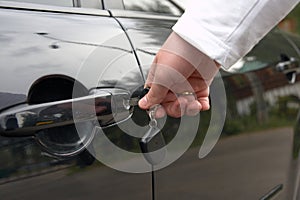 Man unlock car door by key