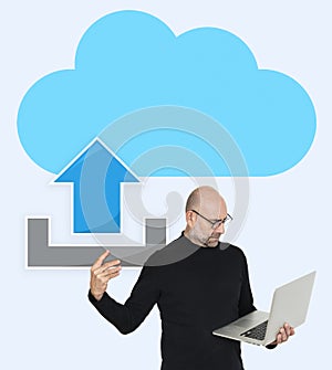 Man uploading to a cloud network photo