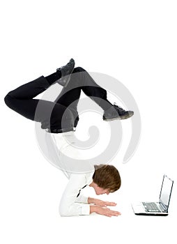 Man upside down using laptop