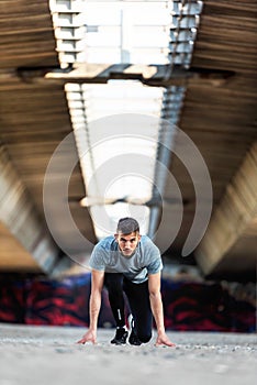 Man urban runner out on the race track