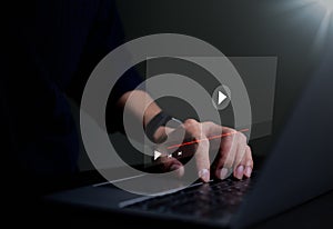 Man use computer for streaming online on virtual screen, watching video on the internet, live content, show or tutorial, content