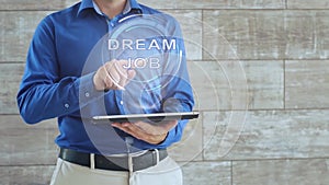Man uses hologram with text Dream job