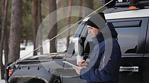 Man Uses Navigation. Winter Day