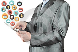 Man uses teblet pc with flying flat round icons