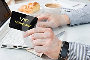 Man uses VIP member card photo