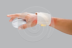The man's arm using a wrist restraint to prevent wrist pain photo
