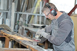 Man using angle grinder