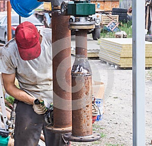 Man using angle grinder