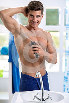 Man using antiperspirant