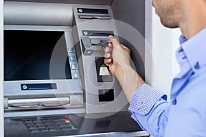 Man using a ATM