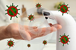 Man using automatic soap dispenser, closeup. Washing hands during coronavirus outbreak