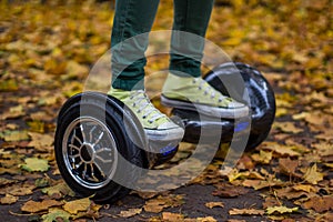 Man is using the black hoverboard