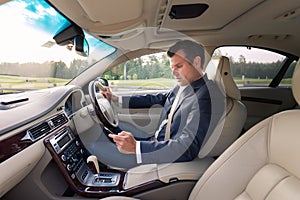 Man using cell phone while driving