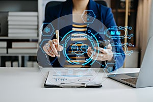 Businessman using chatbot in computer and tablet smart intelligence Ai.Chat with AI Artificial Intelligence, developed by OpenAI