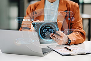 Man using chatbot in computer and tablet smart intelligence Ai.Chat with AI Artificial Intelligence, developed by OpenAI generate