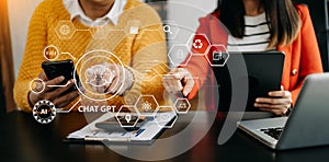 Man using chatbot in computer and tablet smart intelligence Ai.Chat GPT Chat with AI Artificial Intelligence, developed by OpenAI