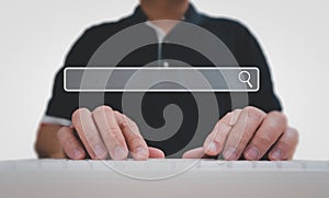 Man using a computer keyboard for searching for information, data search technology search engine optimization