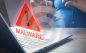 Man using computer laptop with caution warning sing for notification error and virus detection spyware, Internet network security