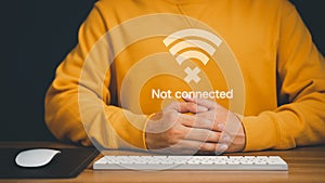 Man using a computer laptop to connect to wifi but wifi not connected, and waiting to loading digital business data form website.