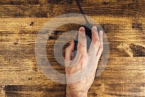 Man using computer mouse, top view