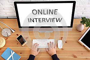 Man using computer for online job interview, top view