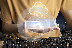 Man using computer showing cloud computing diagram in hand cloud technology data storage network and internet service concept