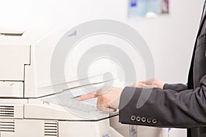 Man using a copy machine (shallow DOF)