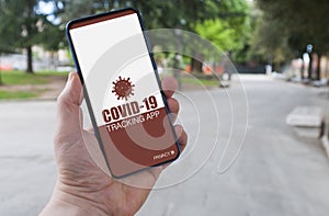 Man using a covid-19 tracking app to prevent contagion from coronavirus