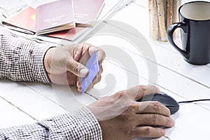 Man using credit card for payment shopping online around travel and journey.