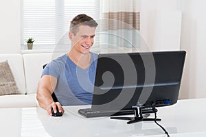 Man Using Desktop Computer