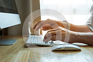 Man using desktop pc computer, mobile office