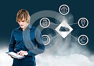Man using digital tablet against cloud computing concept in background