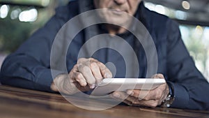 Man using digital tablet close up view