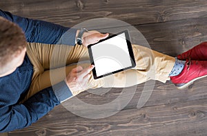 Man using digital tablet. photo