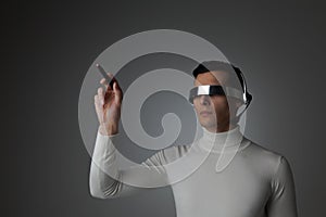 Man using futuristic VR goggles