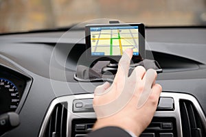 Man using gps navigation while driving