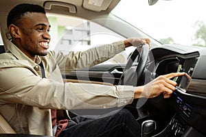 Man Using Gps Navigation System In Car to travel