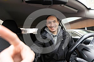 Man Using Gps Navigation System In Car to travel